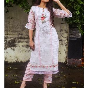 PastPastel pink embroidered kurta crafted in organza fabric with cotton lining.